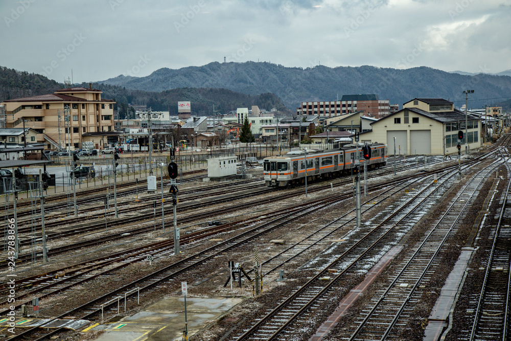  Japanese Railway station in Hida-Takayama station in Chubu, Japan with lot of Railroad tracks
