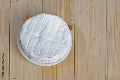 French soft cheese Coulommiers of the Brie family with a bloomy rind white in color and in the shape of a disc