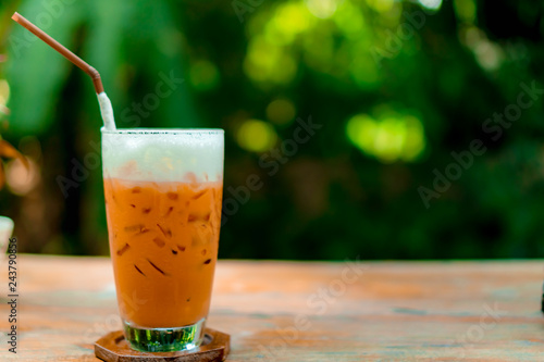 Black coffee or Americano on table with film vintage tone background.