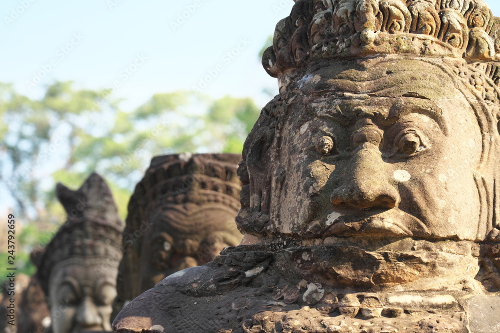 Siem Reap,Cambodia-Januay 11, 2019: Naga and demons on the bridge of the south gate of Angkor Thom, Siem Reap, Cambodia

