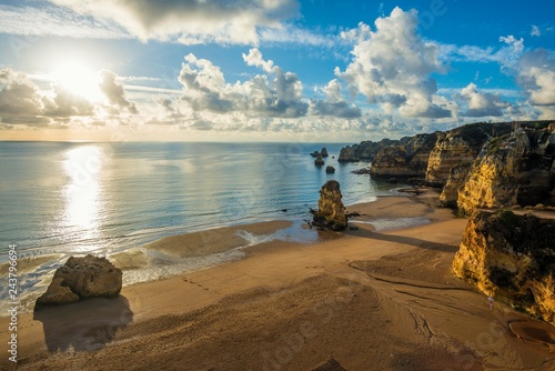 Coloured cliffs and sunrise at the beach, Praia da Dona Ana, Lagos, Algarve, Portugal, Europe photo