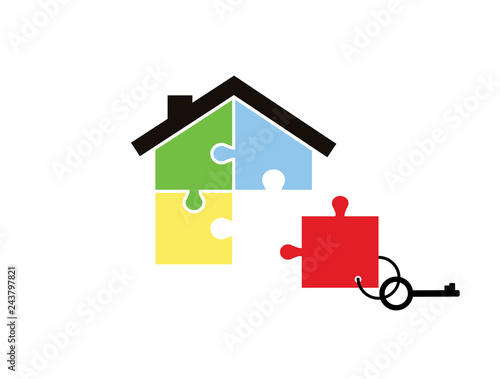 House of pieces of a puzzle and keys with a key fob missing parts isolated on white background. Business, deal, construction, shopping.