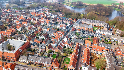 Aerial top view of Naarden city fortified walls in star shape and historic village in Holland from above, Netherlands 