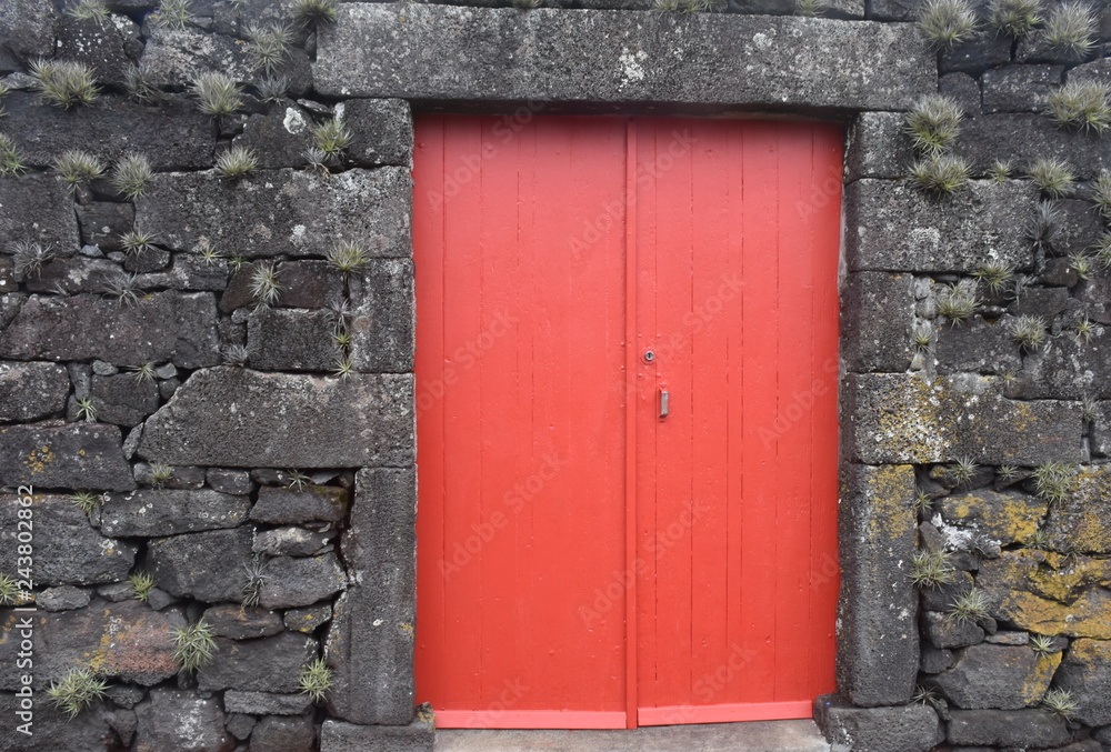 House wall and door onPico island, Azores, Portugal House wall and door onPico island, Azores, Portugal