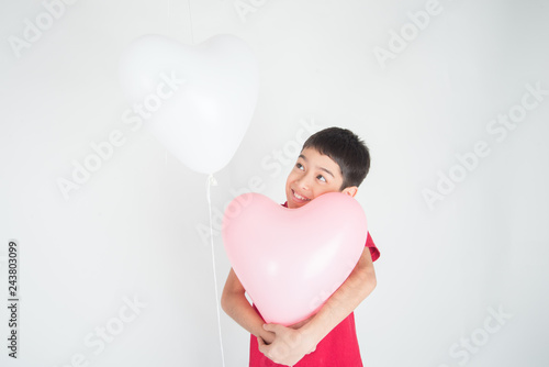 Boy  sibling with balloon  heart shape of love
