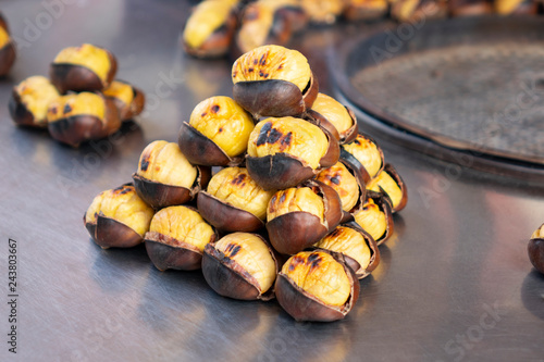 Photography Fried chestnuts on the street. Street food. Roasted chestnuts