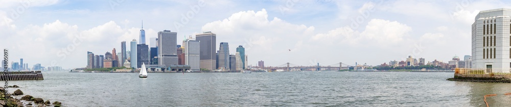 Panorama photo from Governors Island with a stunning view of Jersey City, Manhattan, Brooklyn Bridge and Brooklyn Heights, New York, United States