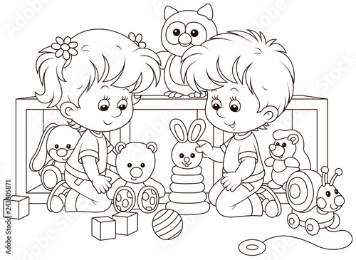 Small children playing with toys in a nursery, black and white vector illustration in a cartoon style for a coloring book