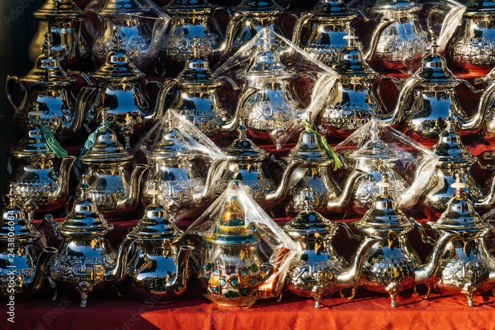 Moroccan Arab oriental Iron kettles for Moroccan tea on the market in Medina, Marrakesh, Morocco