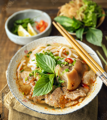 Bun Bo Hue, Bun Bo, Vietnamese beef noodle soup spicy. A bowl of beef & rice vermicelli soup, vietnamese noodle cuisine in Hue, Vietnam. © Max D. Photography