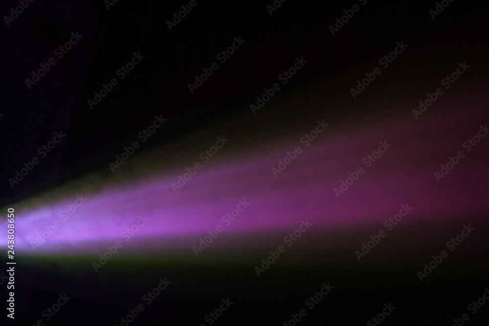 beautiful purple pantone color wide lens projector spotlight . smoke abstract texture black background . screening for multimedia .