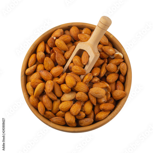 Almonds in wooden bowl isolated on a white background