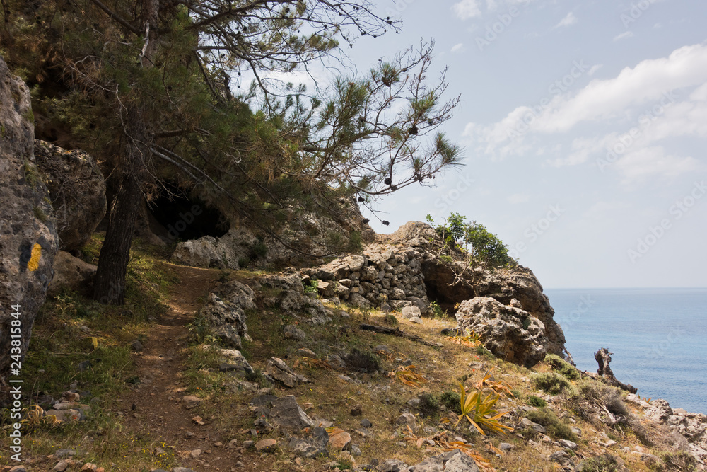 Small cave on e4 trail between Loutro and Agia Roumeli at south-west od Crete island, Greece