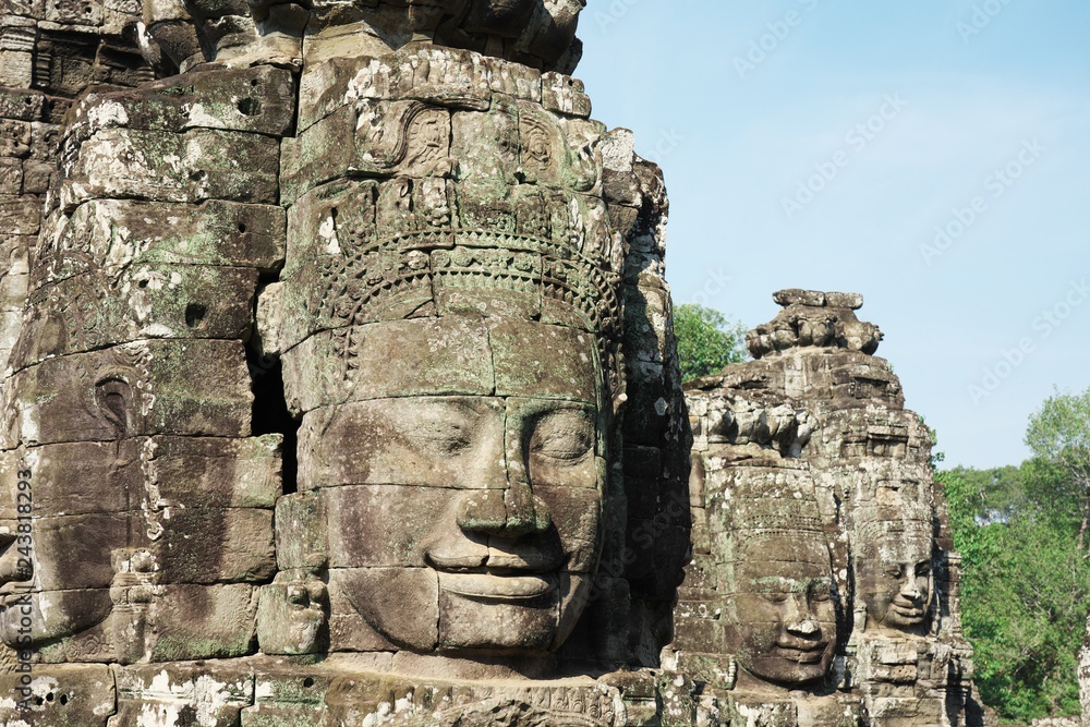 Siem Reap,Cambodia-Januay 11, 2019: Three Bodhisattva faces of Angkor Thom, Siem Reap