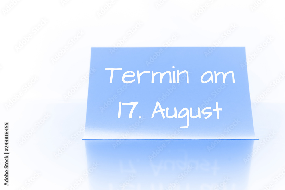 Termin am 17. August - blauer Zettel mit Notiz Termin am 17. August - blauer Zettel mit Notiz