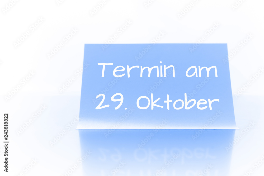 Termin am 29. Oktober - blauer Zettel mit Notiz Termin am 29. Oktober - blauer Zettel mit Notiz