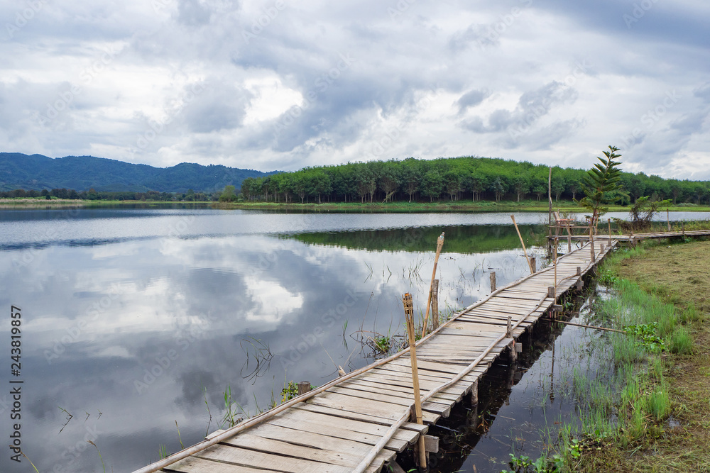 Scenic view landscape of bamboo bridge and lake.
