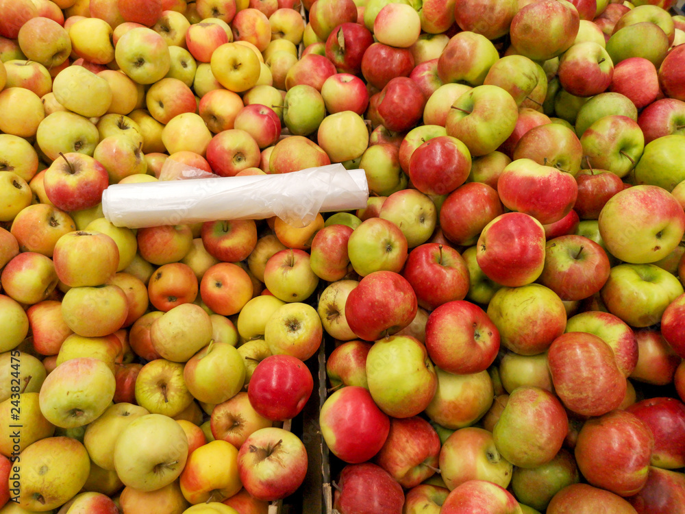 Ripe apples in the store as background Ripe apples in the store as background