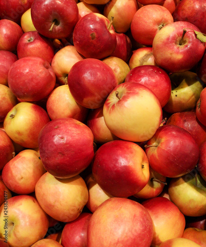 Ripe red apples as background