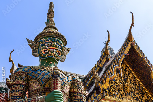 Thai antique sculpture, giant sculpture at Wat Phra Keaw, temple of the emerald buddha, Bangkok photo