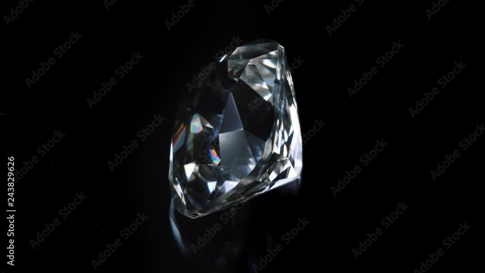 The gem revolves around its axis. Black background. The gem revolves around its axis. Black background.