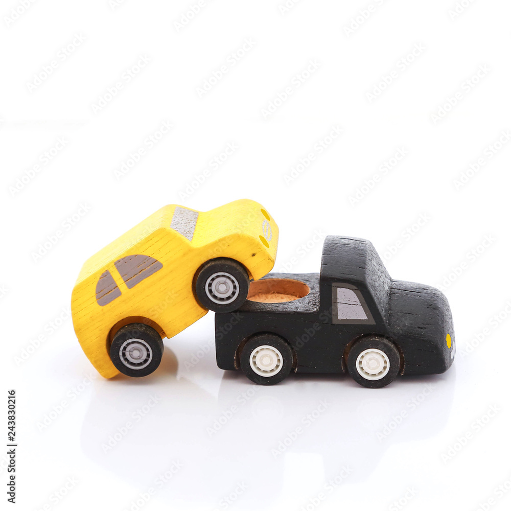 wooden car toy on white background.