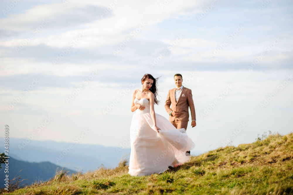 Young love couple celebrating a wedding in the mountains Young love couple celebrating a wedding in the mountains