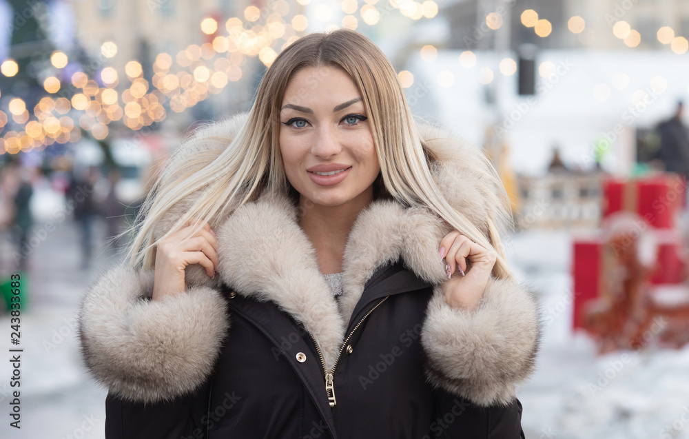 Attractive young woman in wintertime outdoor Attractive young woman in wintertime outdoor