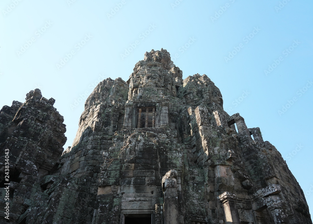 Siem Reap,Cambodia-Januay 11, 2019: Bodhisattva face towers viewed near the east gate of Bayon, Angkor Thom, Siem Reap