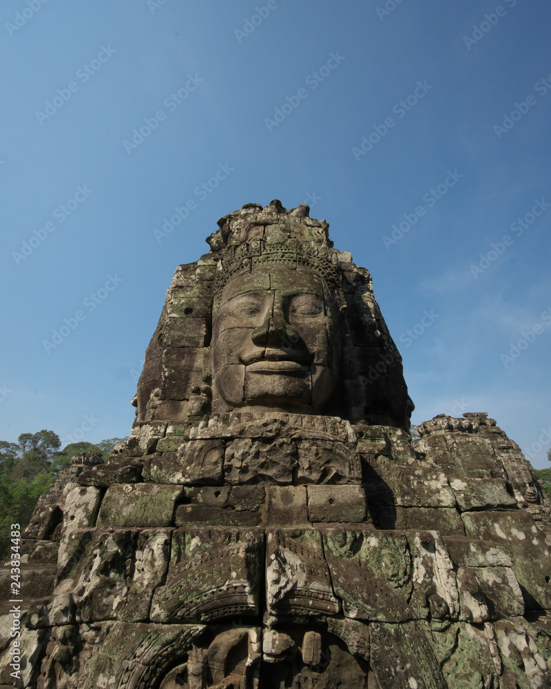 Siem Reap,Cambodia-Januay 11, 2019: Bodhisattva face towers viewed from the upper terrace of Bayon, Angkor Thom, Siem Reap
