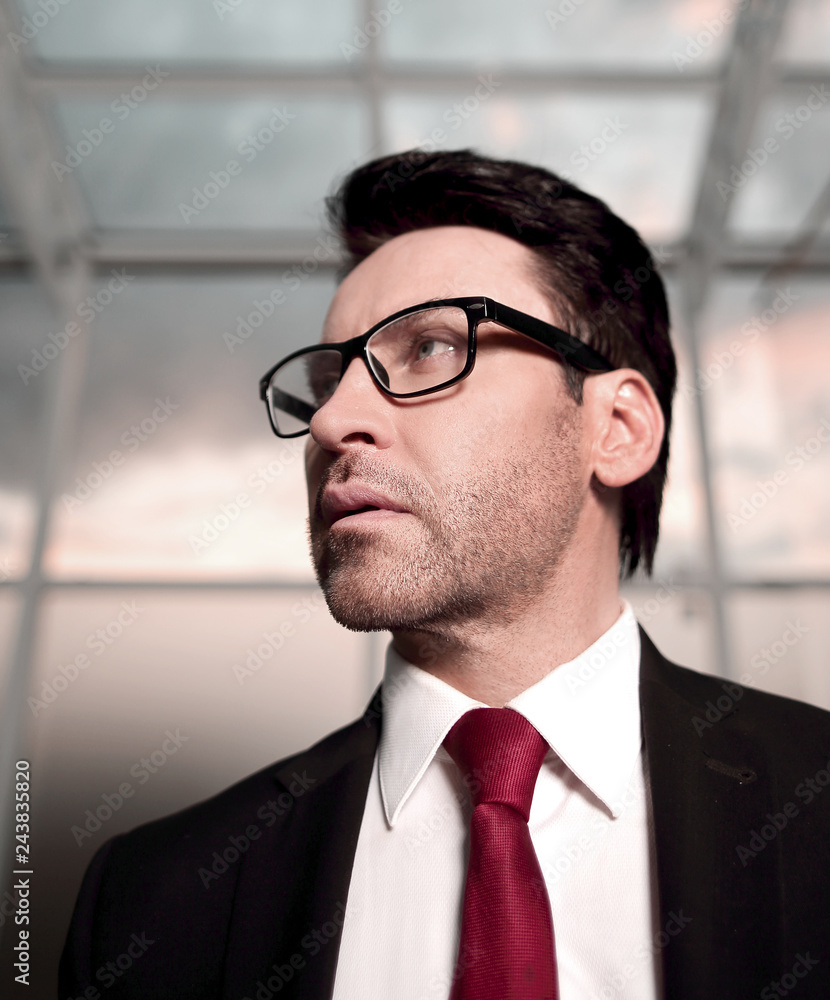 close up.responsible businessman standing in the office close up.responsible businessman standing in the office