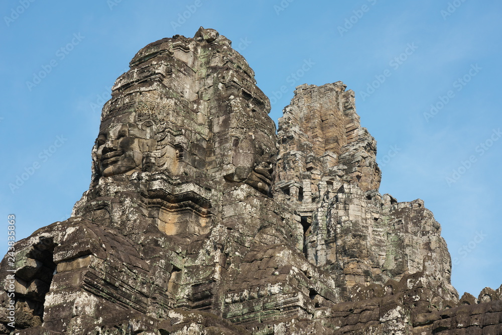 Siem Reap,Cambodia-Januay 11, 2019: Bodhisattva face towers viewed near the east gate of Bayon, Angkor Thom, Siem Reap

