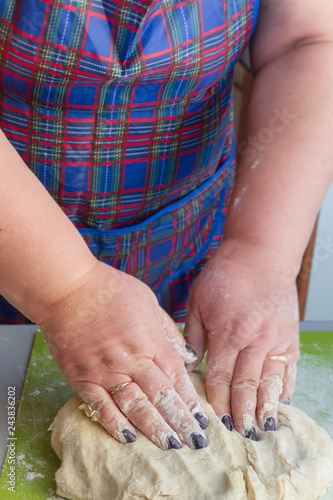 Knead the dough with your hands on the table