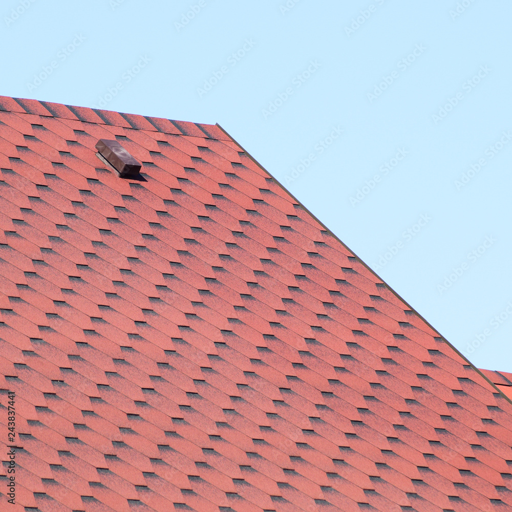 Decorative metal tile on a roof Decorative metal tile on a roof