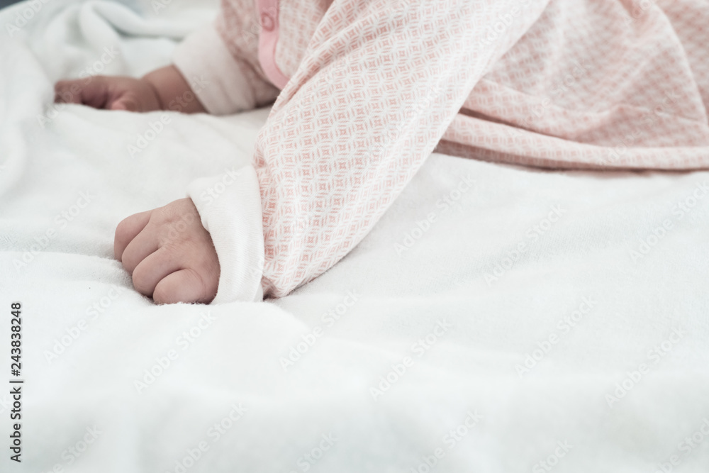 Baby hand on blanket background for text space Baby hand on blanket background for text space