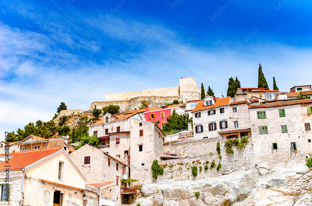 Buildings of the old town in Sibenik, Croatia, on sunny summer day.