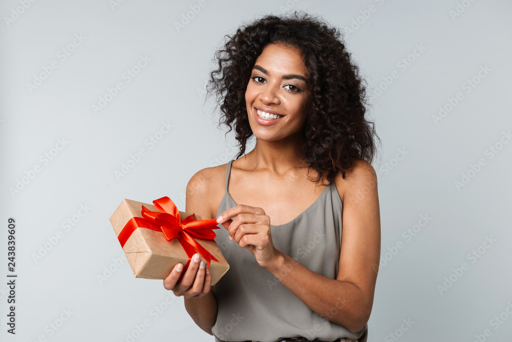 Fototapeta premium Full length of a happy young african woman