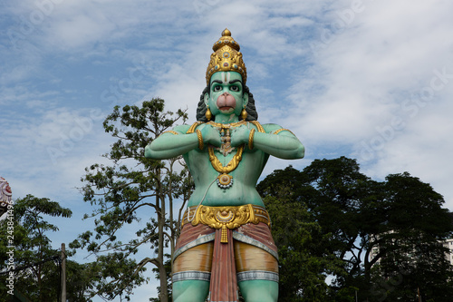 Hanuman statue in front of Ramayana Cave at Batu Caves complex. Batu Caves is a limestone hill that has a series of caves and cave temples in Gombak, Selangor, near Kuala Lumpur, Malaysia. 