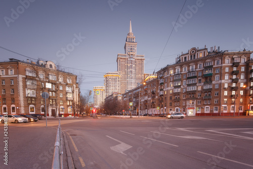 Moscow, Russia. The intersection with views of the tallest apartment building Triumph Palace. City streets on a winter evening