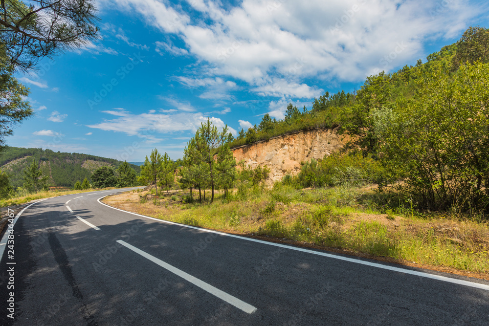 Road in the middle of nature without cars.