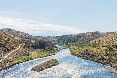 Landscape over the dam of Barragem do Fratel photo