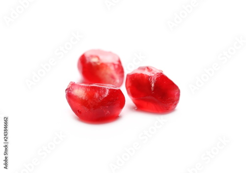 Pomegranate seeds isolated on white background, macro © dule964