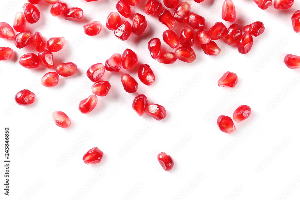 Pomegranate seeds pile isolated on white background, top view Pomegranate seeds pile isolated on white background, top view