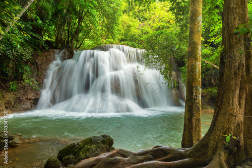Fototapeta Naklejka Na Ścianę i Meble -  Beautiful and Breathtaking green waterfall at the tropical rainforest, Erawan's waterfall, Located Kanchanaburi Province, Thailand