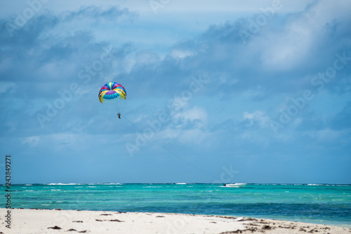 Kite surfing on tropical beach