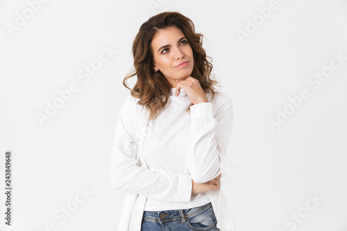 Portrait of european woman 30s in casual clothes standing, isolated over white background