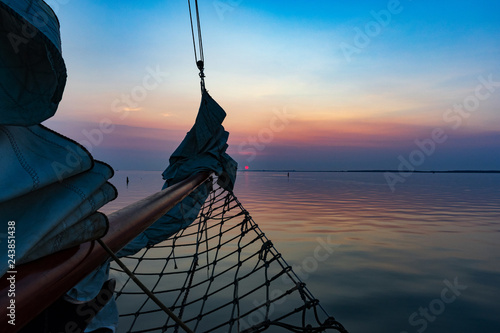 A summer sunset on a sailing boat