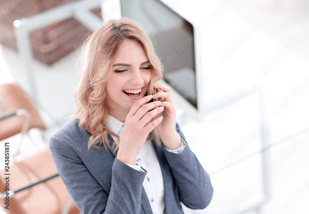 closeup.young employee talking on the phone closeup.young employee talking on the phone