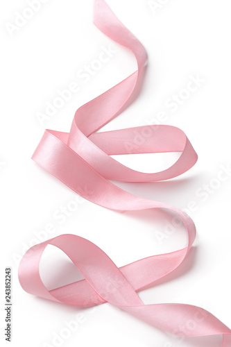 Pink ribbon on white background