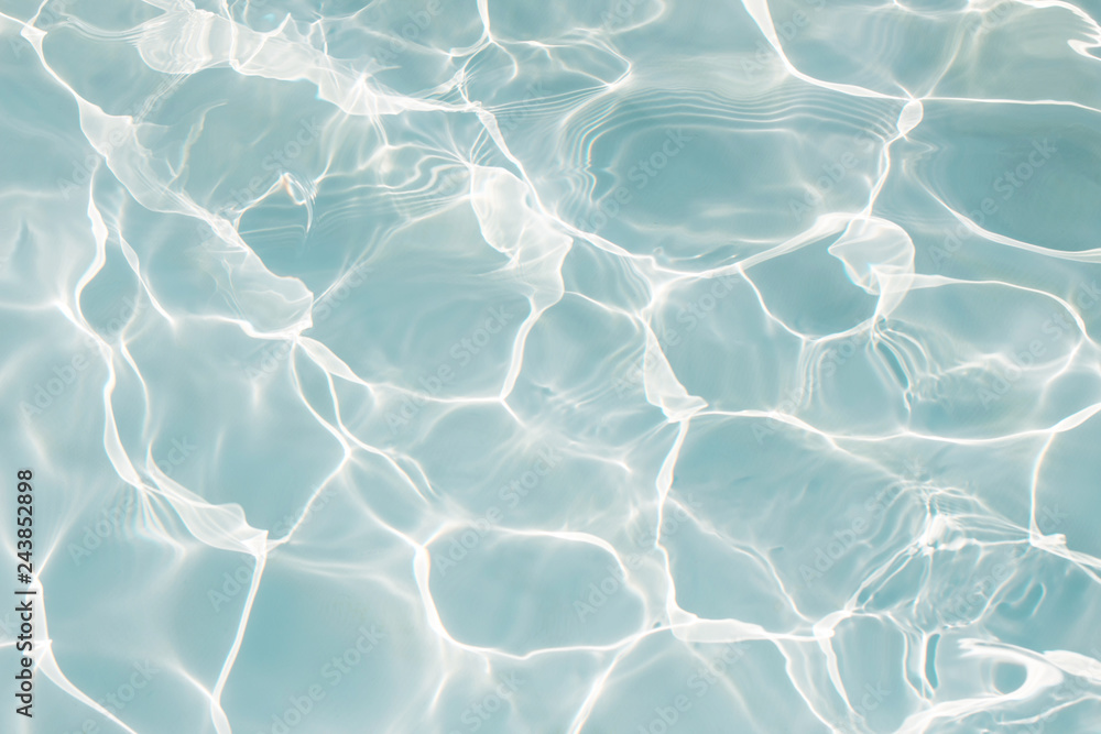 © jintana - Texture of water in swimming pool for background